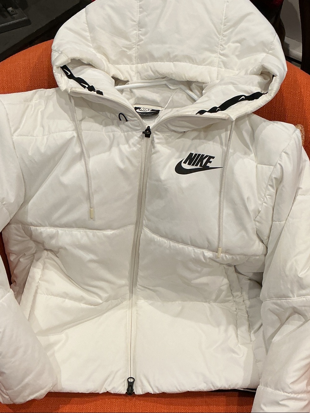 Nike Women's White Hooded Puffer Jacket with Black Swoosh